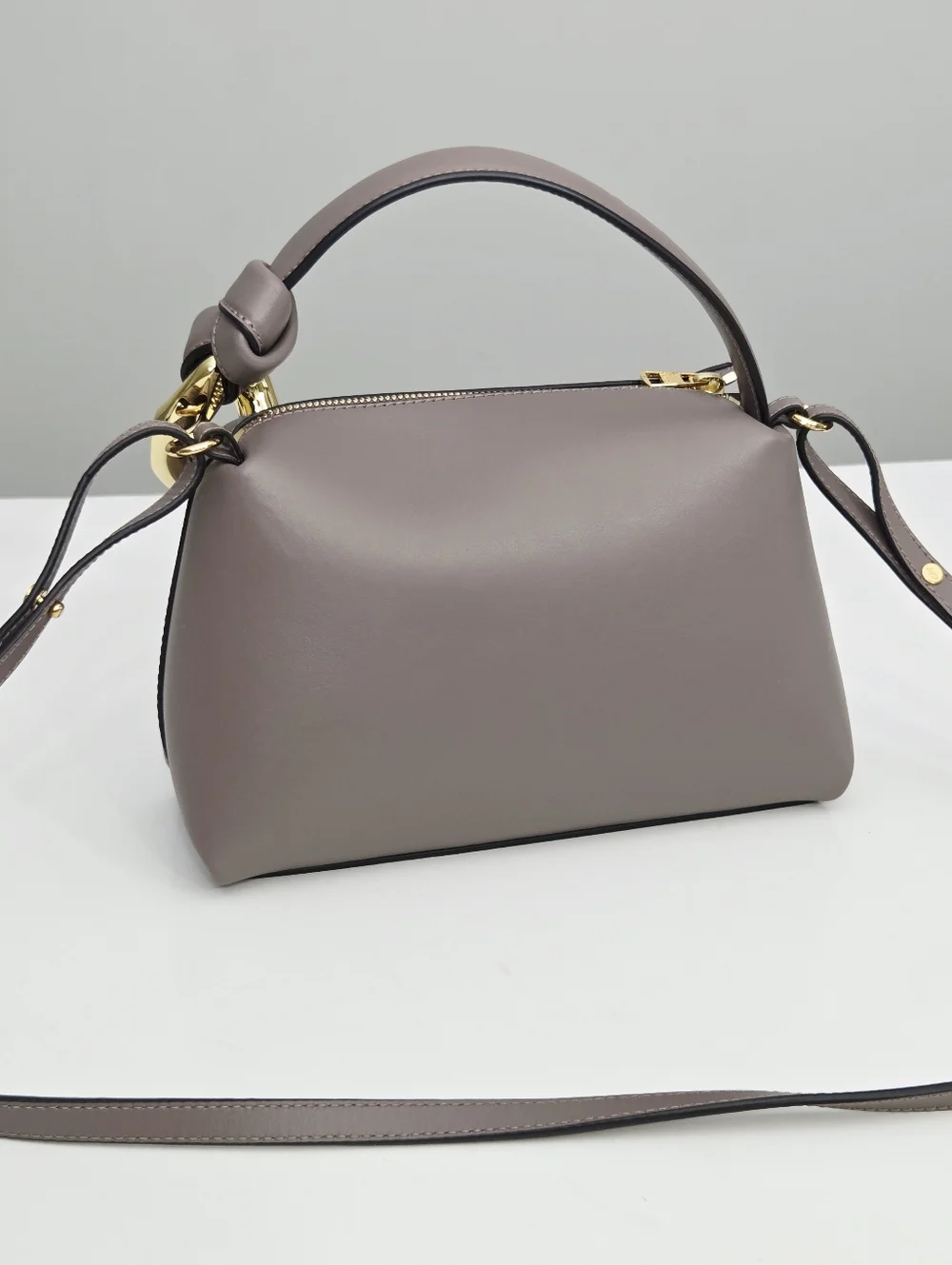 JW ANDERSON THE JWA SMALL CORNER BAG - TAUPE LEATHER